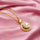 The Grounded Collection - Spinning Necklace Gold Plated with Clear Gems